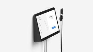Logitech Tap Wall Mount - mounted with magnetic cable dock holding HDMI cable connector